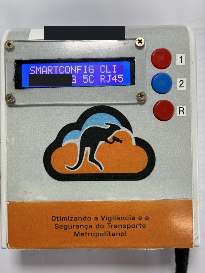 Unidade SmartConfig: caixa com display de duas linhas mostrando SMARTCONFIG CLI, três botões e o logo Canguru